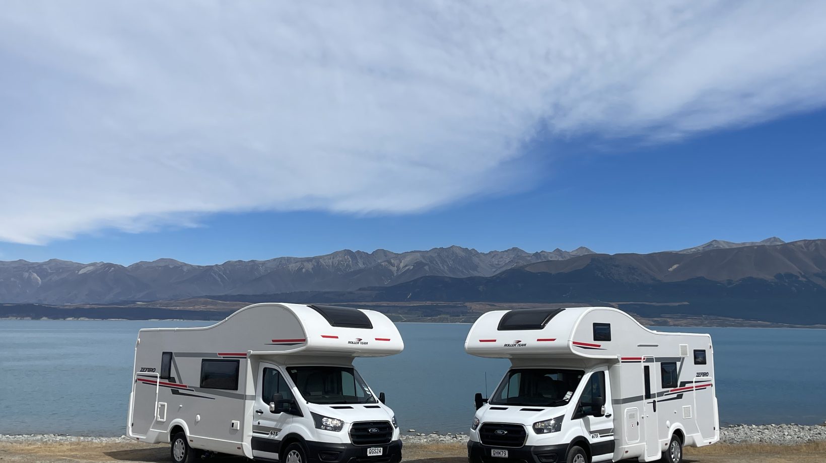 SpringLight motorhomes beside a South Island lake on a campervan trip from Christchurch